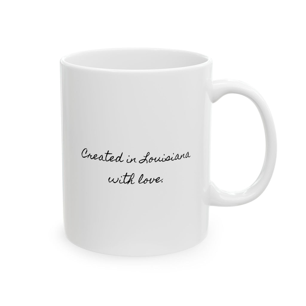White mug with 'Created in Louisiana with love' text on a white background