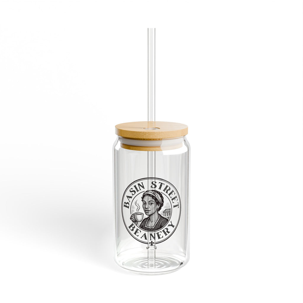 Clear tumbler with wooden lid and straw featuring Basin Street Beanery logo on a white background
