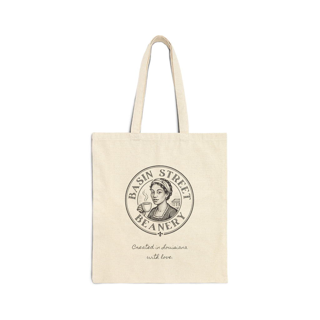 Beige tote bag with 'Basin Street Beanery' logo on a white background